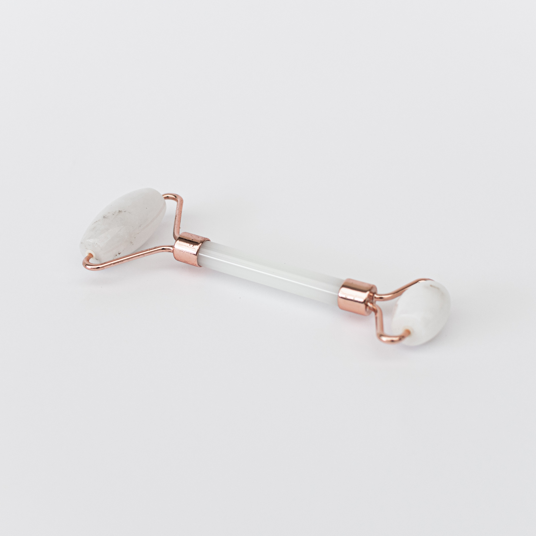 Face Roller Cuarzo Blanco - Rodillo masajeador de cuarzo blanco para rostro